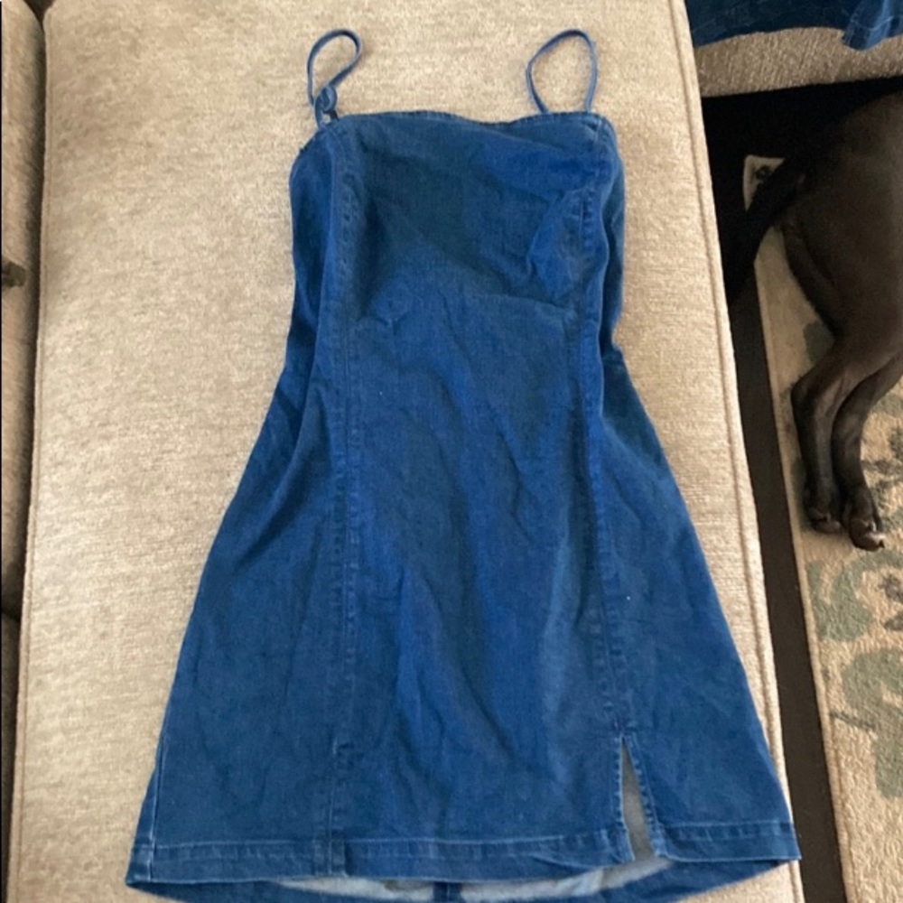 Jean dress with open back that criss crosses and ties to a string bow